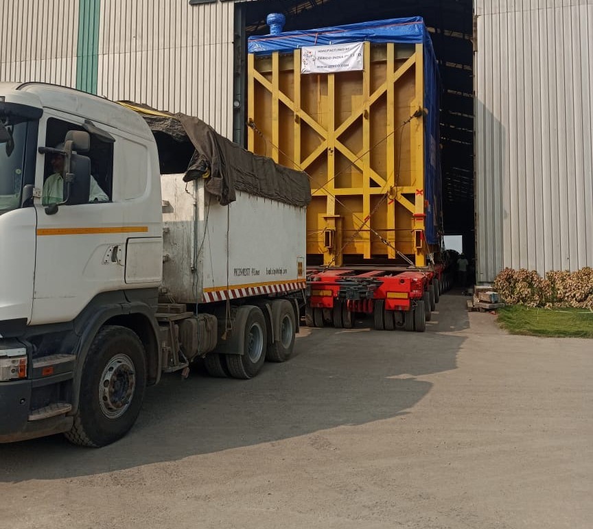 Oversized industrial cargo being moved from a manufacturing facility